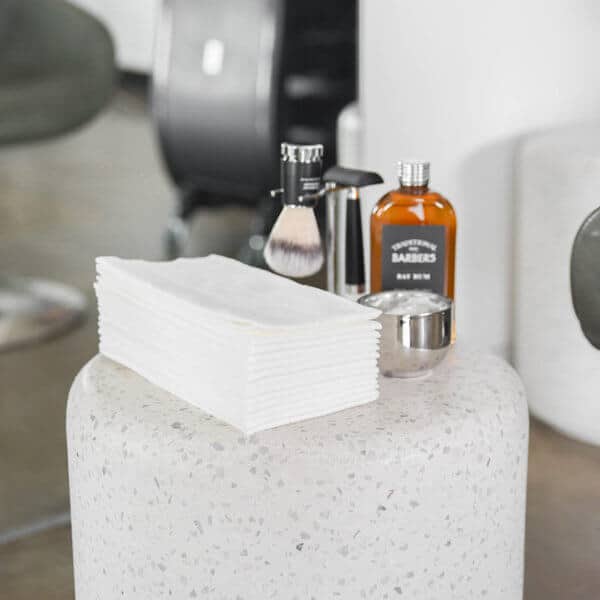 Easydry barber towel or thermal towel or hot shave towel. It is thicker than standard Easydry towels and has a special texture. It can be heated or chilled and used for hot shaves, facials or thermal treatments. It measures 43 x 43 cm.