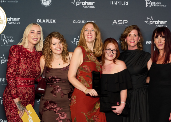 Rebel Rebel Hair Studio with Emma Reilly from Easydry after receiving the Professional Sustainable Salon of the Year trophy at the Pro Hair Awards 2026.