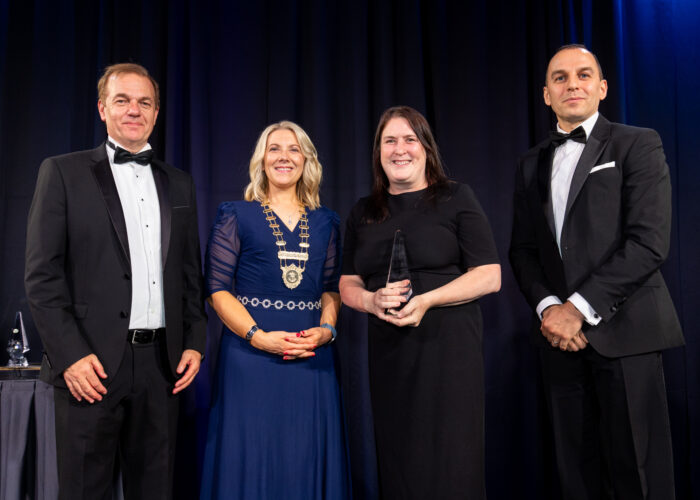 Easydry CEO Anne Butterly accepting the Sustainable Trade Exporter of the Year 2025 award for Easydry’s compostable salon towels.