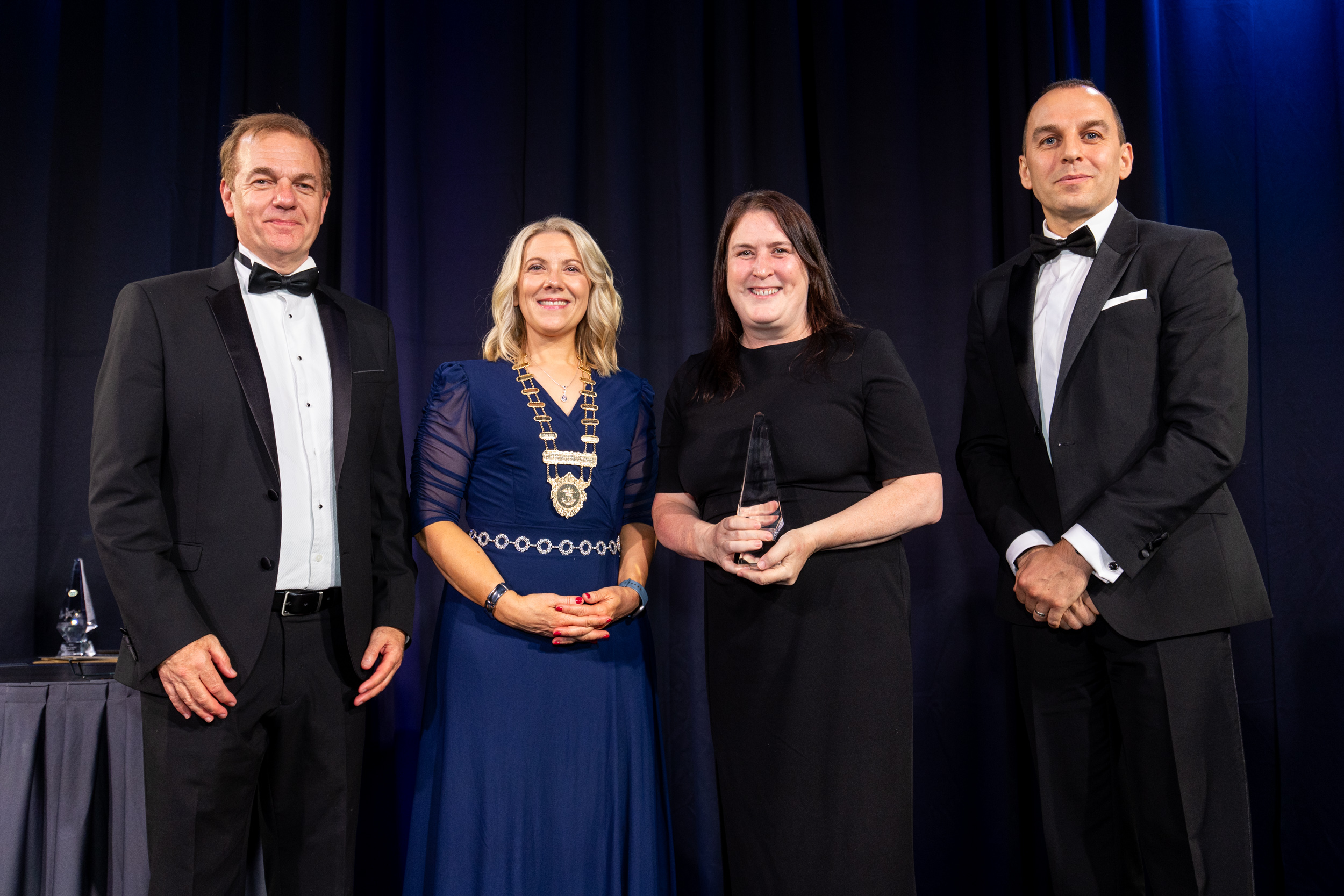 Easydry CEO Anne Butterly accepting the Sustainable Trade Exporter of the Year 2025 award for Easydry’s compostable salon towels.