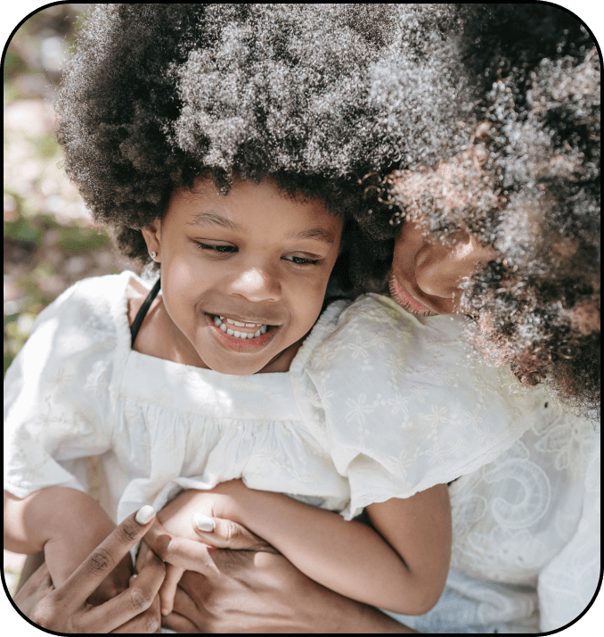 Easydry blog on caring for type 4 hair featuring an image of a women and child with textured hair from the Carra website.
